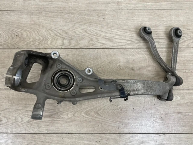 Кулак поворотный левый для Audi Q7 4M 2015+ на фотографиях