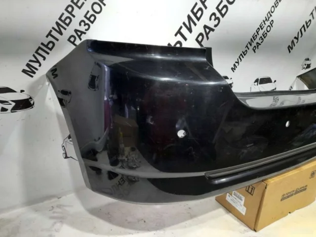 Бампер задний для Toyota Corolla E120/E130 Хэтчбек 2001-2007 на фотографиях