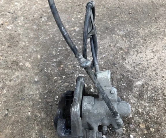 Суппорт задний левый для Honda Civic FA 2005-2010 седан на фотографиях