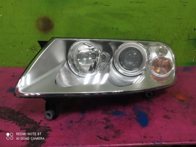 Фара ксенон левая для Volkswagen Touareg I (7L) 2002-2010 на фотографиях
