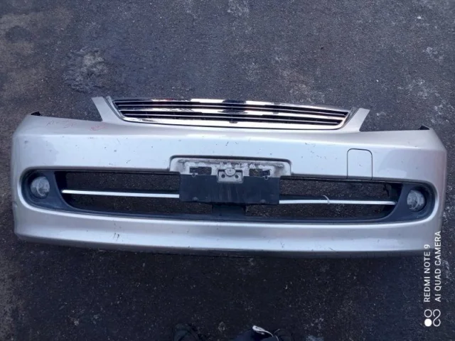 Бампер для Nissan Tiida C11 Хэтчбек 2007-2014 на фотографиях