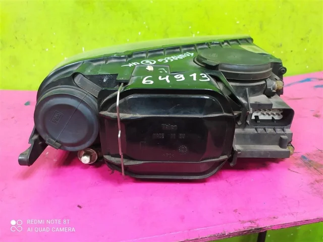 Фара ксенон левая для Volkswagen Touareg I (7L) 2002-2010 на фотографиях