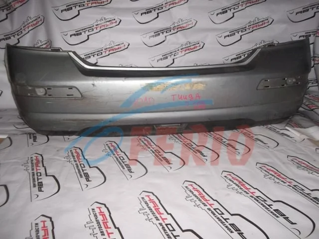 Бампер задний для Nissan Tiida SC11 Седан 2007-2014 на фотографиях