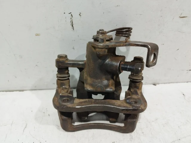 Суппорт задний левый для Hyundai Solaris 1 RB (2011-2013) на фотографиях