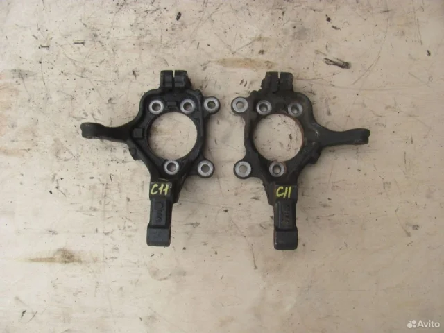 Кулак поворотный левый для Nissan Tiida C11 Хэтчбек 2007-2014 на фотографиях