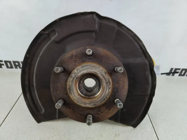 Кулак поворотный левый для Mitsubishi Pajero V90 5dr 2006-2011 на фотографиях