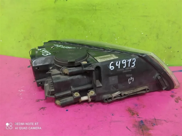 Фара ксенон левая для Volkswagen Touareg I (7L) 2002-2010 на фотографиях