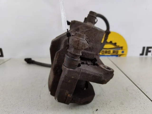 Суппорт передний левый для Suzuki Grand Vitara 2005-2014 на фотографиях