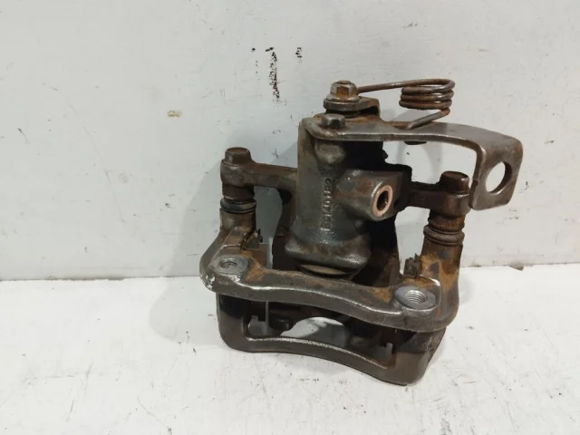 Суппорт задний левый для Hyundai Solaris 1 RB (2011-2013) на фотографиях