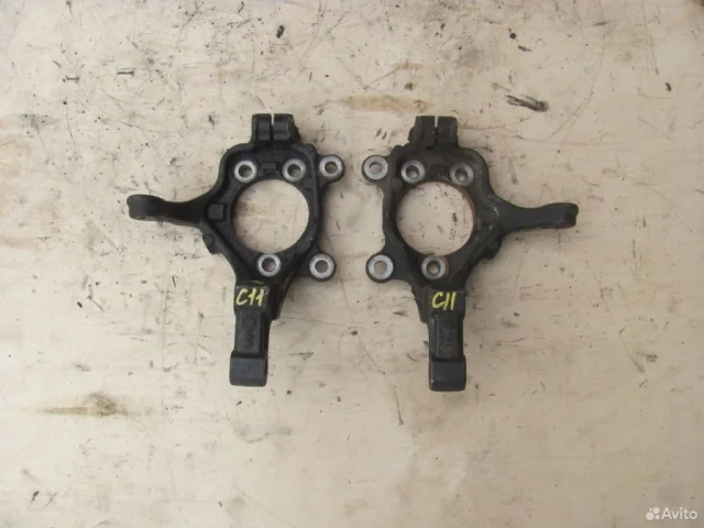 Кулак поворотный левый для Nissan Tiida C11 Хэтчбек 2007-2014 на фотографиях