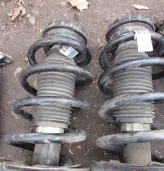 Амортизатор передний левый для Кадиллак Эскалейд