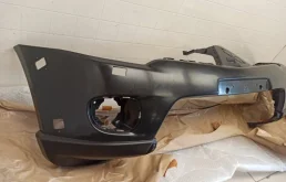 Бампер передний для Mitsubishi Pajero Sport на фотографиях