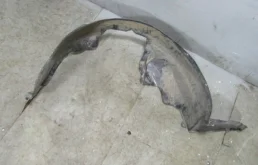 Подкрылок передний правый для Chevrolet Lacetti 2009 года на фотографиях