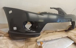 Бампер передний для Mitsubishi Pajero Sport на фотографиях