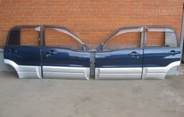 Дверь передняя левая для Suzuki Grand Vitara 2001 года на фотографиях