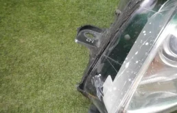 Фара ксенон левая для Opel Insignia 2013 года на фотографиях