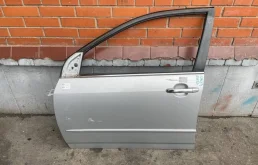 Дверь передняя левая для Toyota Corolla 2001 года на фотографиях