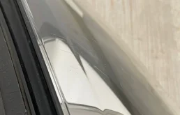 Фара ксенон левая для Volkswagen Touareg 2011 года на фотографиях