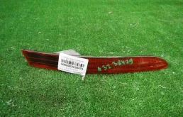 Отражатель (катафот) заднего бампера правый для Volkswagen Touareg 2018 года на фотографиях