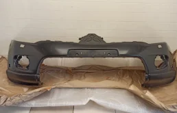 Бампер передний для Mitsubishi Pajero Sport на фотографиях