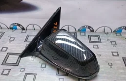 Стекла и зеркала для BMW 7er 2009 года на фотографиях