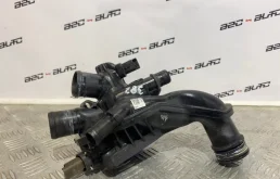 Корпус термостата системы охлаждения ДВС для Citroen C5 2012 года на фотографиях