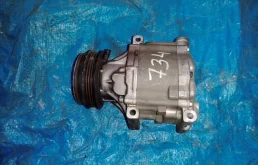 Компрессор кондиционера для Subaru Legacy 2009 года на фотографиях