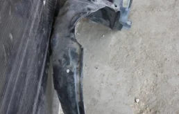 Подкрылок передний левый для Toyota Corolla 2003 года на фотографиях