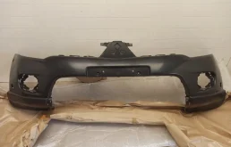 Бампер передний для Mitsubishi Pajero Sport на фотографиях