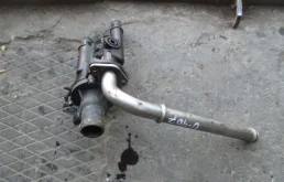 Корпус термостата системы охлаждения ДВС для Opel Astra на фотографиях