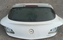 Дверь багажника для Opel Astra 2013 года на фотографиях