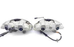 Скоба суппорта передняя для Audi A8 на фотографиях