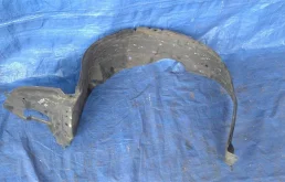 Подкрылок передний левый для Toyota Corolla 2003 года на фотографиях