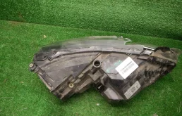 Фара ксенон левая для Skoda Rapid 2014 года на фотографиях