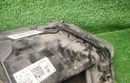 Фара ксенон левая для Skoda Rapid 2014 года на фотографиях