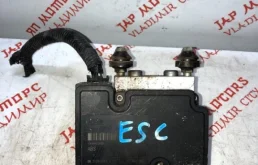 Блок ABS для Suzuki Grand Vitara 2003 года на фотографиях