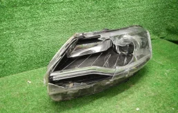 Фара ксенон левая для Skoda Rapid 2014 года на фотографиях