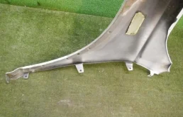 Крыло правое для Audi Q3 2011 года на фотографиях