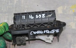 Ручка багажника для Toyota Corolla 2003 года на фотографиях