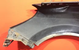 Крыло левое для Opel Astra 2008 года на фотографиях