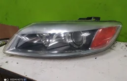 Фара ксенон левая для Audi Q7 2009 года на фотографиях