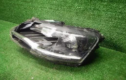 Фара ксенон левая для Skoda Rapid 2014 года на фотографиях