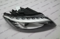 Кронштейн правой фары нижний для Audi Q7 2010 года на фотографиях