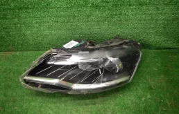 Фара ксенон левая для Skoda Rapid 2014 года на фотографиях