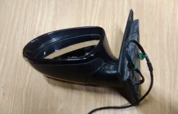 Зеркало боковое левое для Volkswagen Passat 2009 года на фотографиях