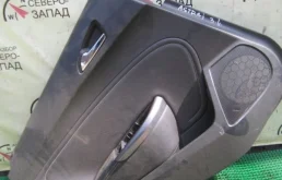 Обшивка дверей Opel Astra 13258735 J A16XER, задняя левая