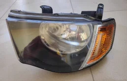 Фара Mitsubishi L200 2011 MN146195 KB4T 4D56, левая