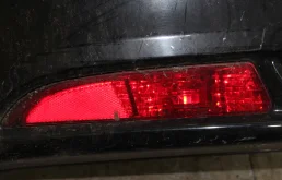 Отражатель в задний бампер левый HONDA Civic IX (2011—2015)