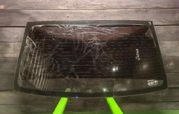 Стекло заднее Renault Logan