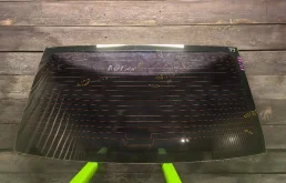 Стекло заднее Renault Logan